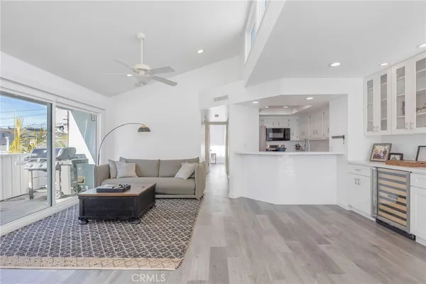 a living room with furniture and a rug