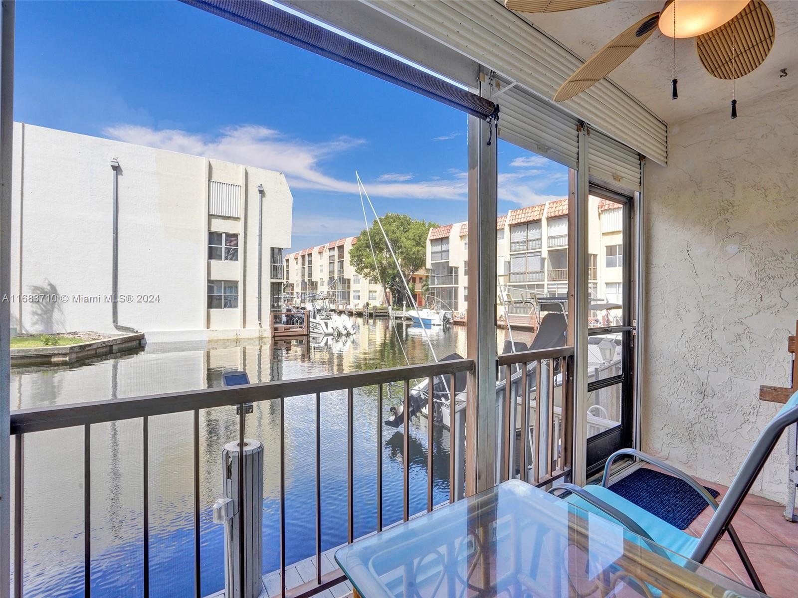 777 South Federal Highway, Unit K102 Pompano Beach, FL 33062 - Photo 1 of 24 a view of a balcony with chairs