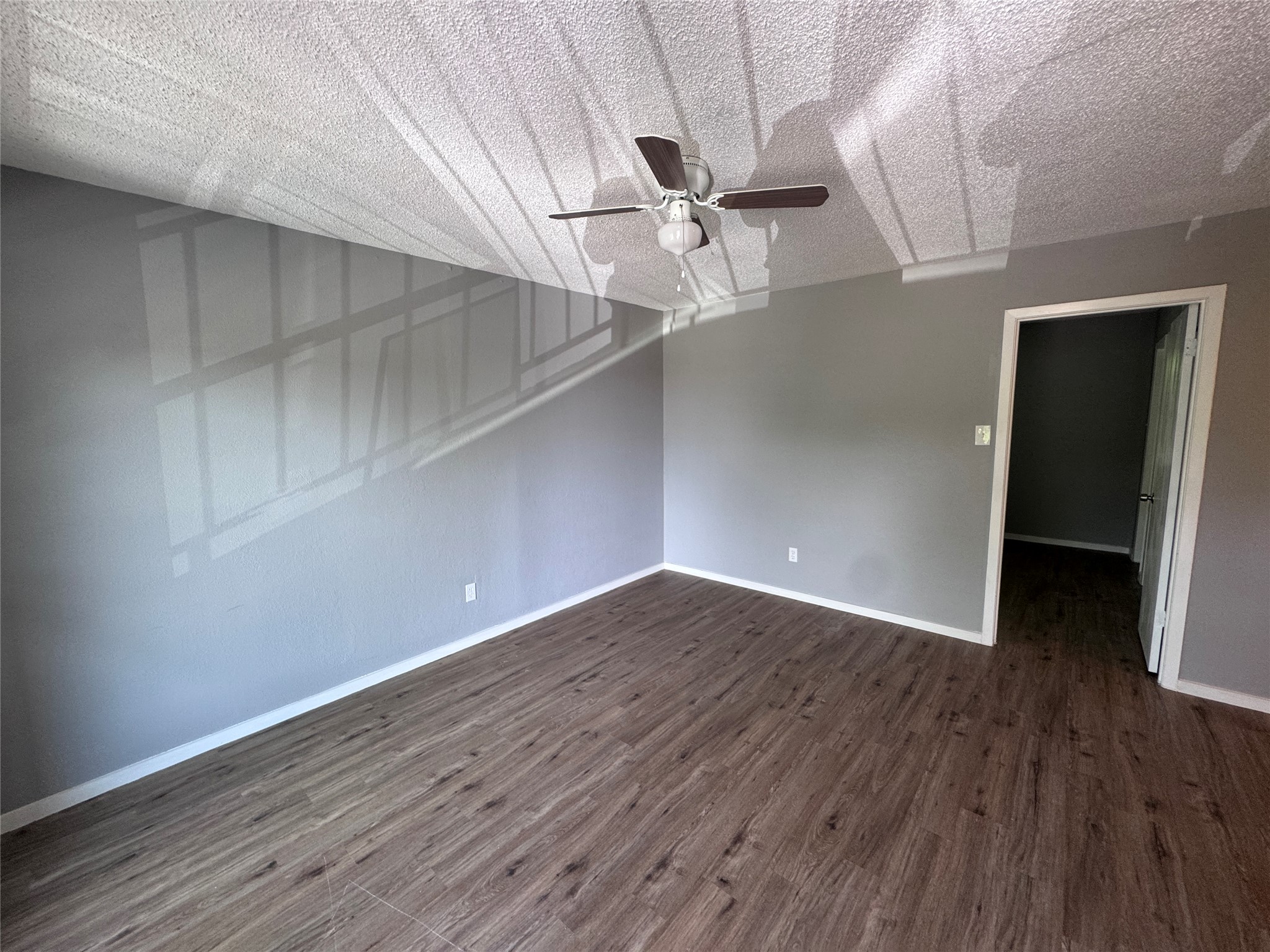 309 East Dean Avenue, Unit 2 Killeen, TX 76541 - Photo 5 of 13 wooden floor in an empty room