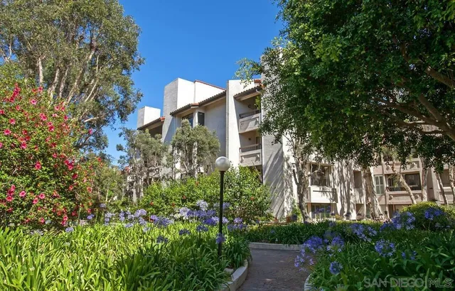 a view of a swimming pool with chairs
