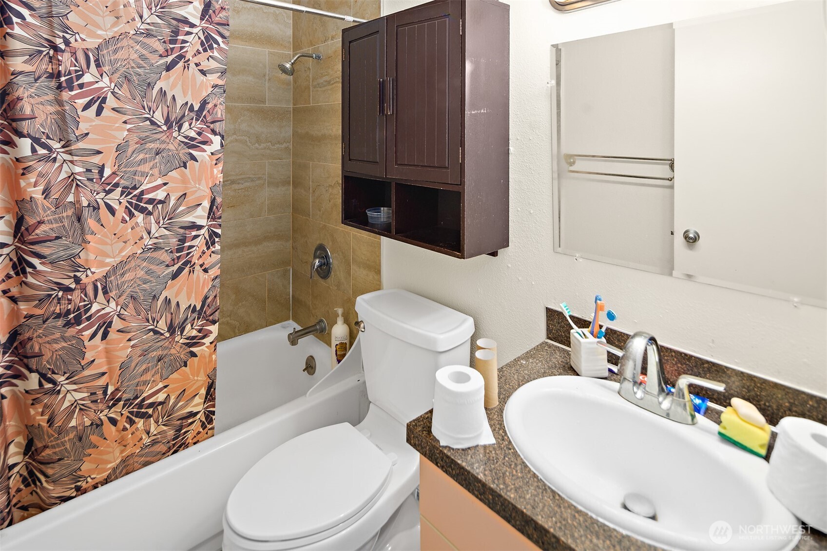 739 3rd Avenue South Kent, WA 98032 - Photo 18 of 33 a bathroom with a granite countertop toilet sink and mirror