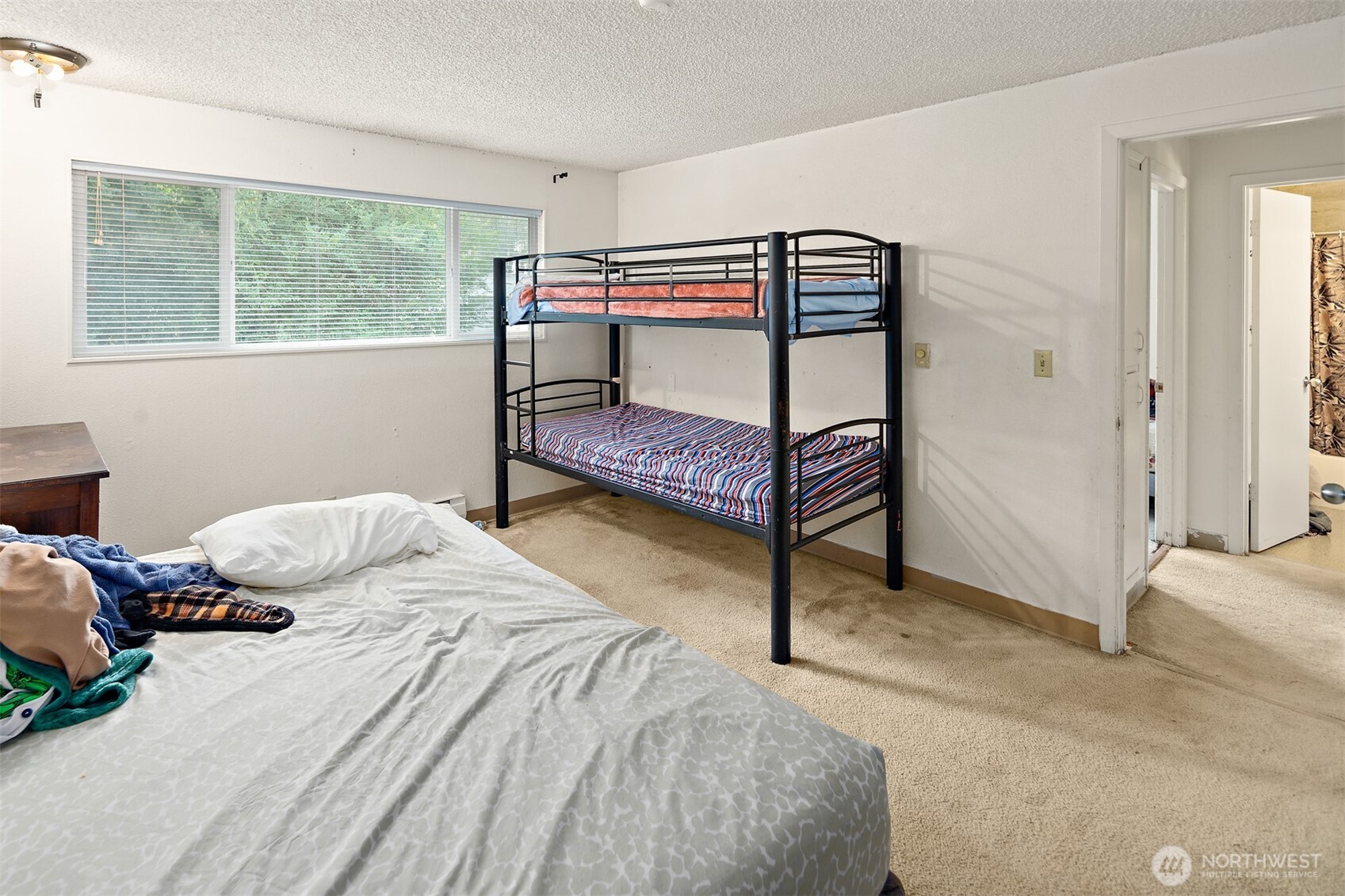 739 3rd Avenue South Kent, WA 98032 - Photo 19 of 33 a bedroom with a bed and a window