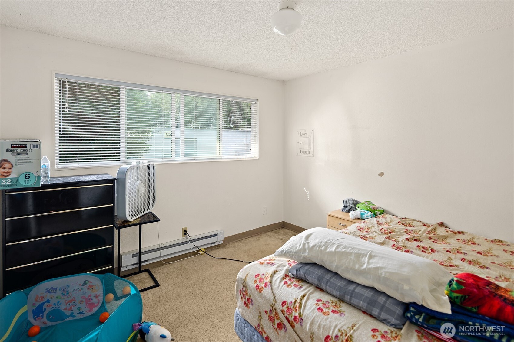739 3rd Avenue South Kent, WA 98032 - Photo 22 of 33 a bedroom with a bed and a window