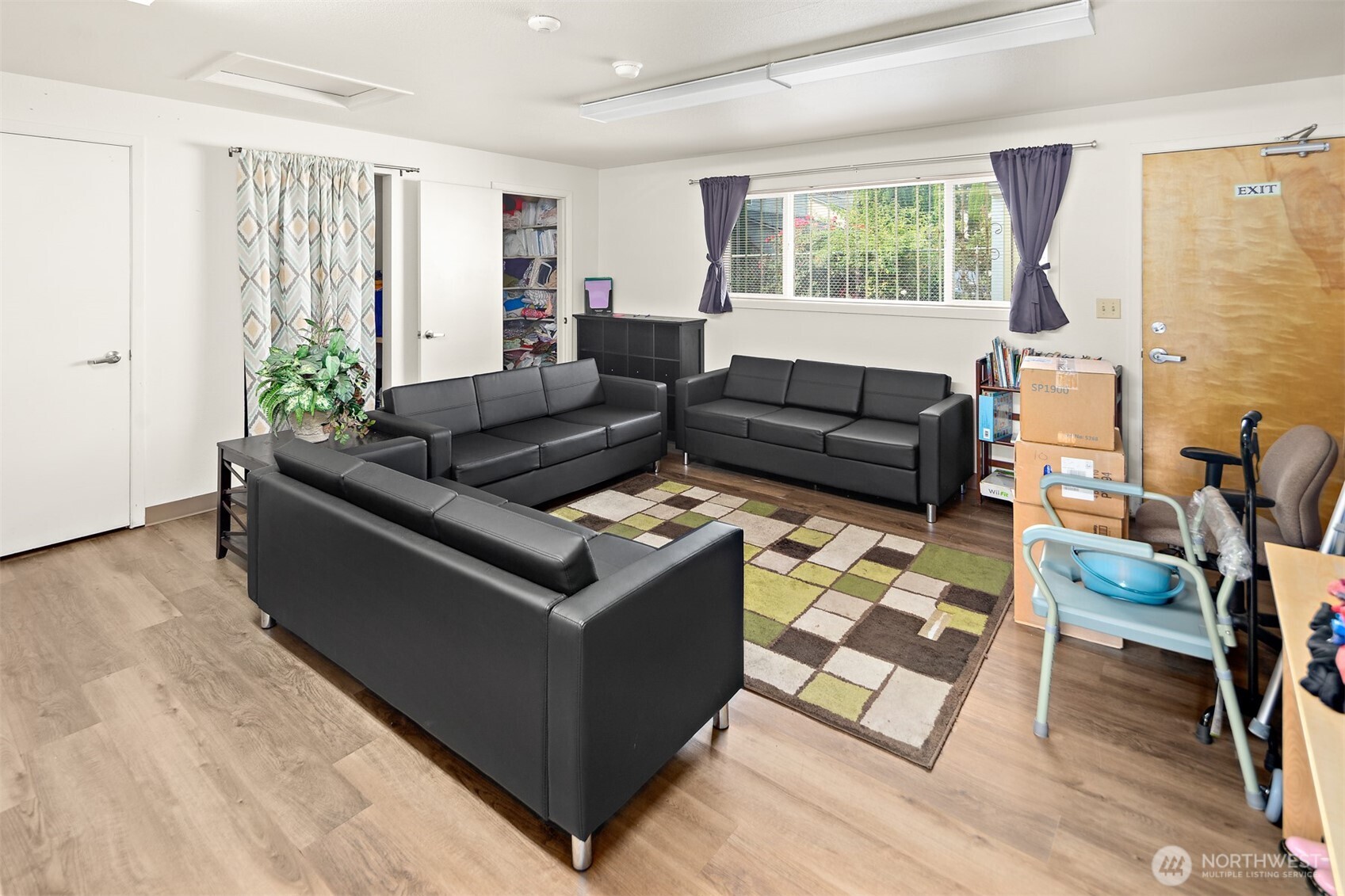 739 3rd Avenue South Kent, WA 98032 - Photo 24 of 33 a living room with furniture and a flat screen tv
