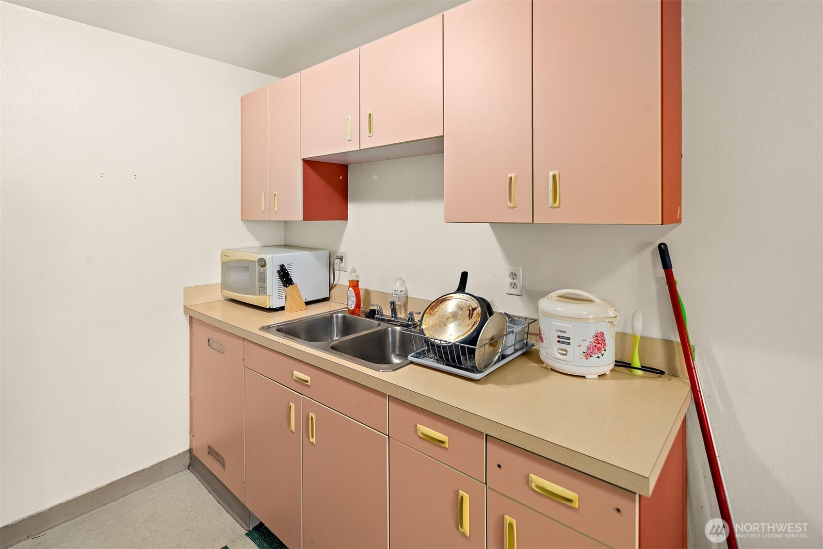 739 3rd Avenue South Kent, WA 98032 - Photo 28 of 33 a kitchen with sink and cabinets