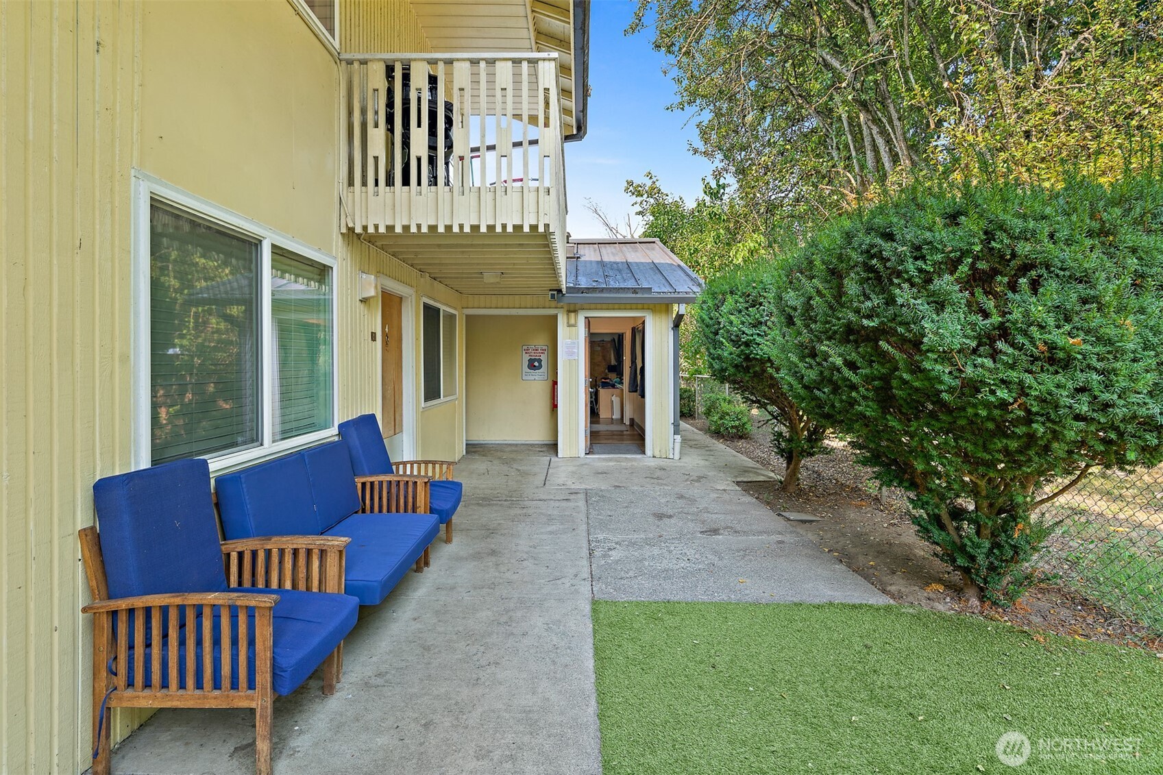 739 3rd Avenue South Kent, WA 98032 - Photo 4 of 33 a view of a house with a deck and a yard