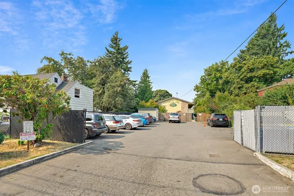 a view of a street with cars on road