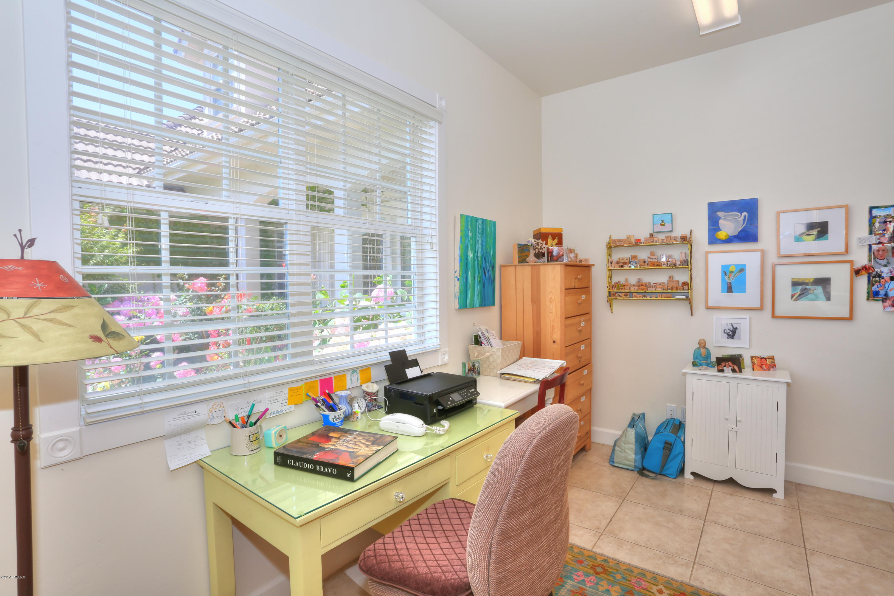 959 Old Ranch Road Solvang, CA 93463 - Photo 25 of 29 a living room filled with furniture and a table