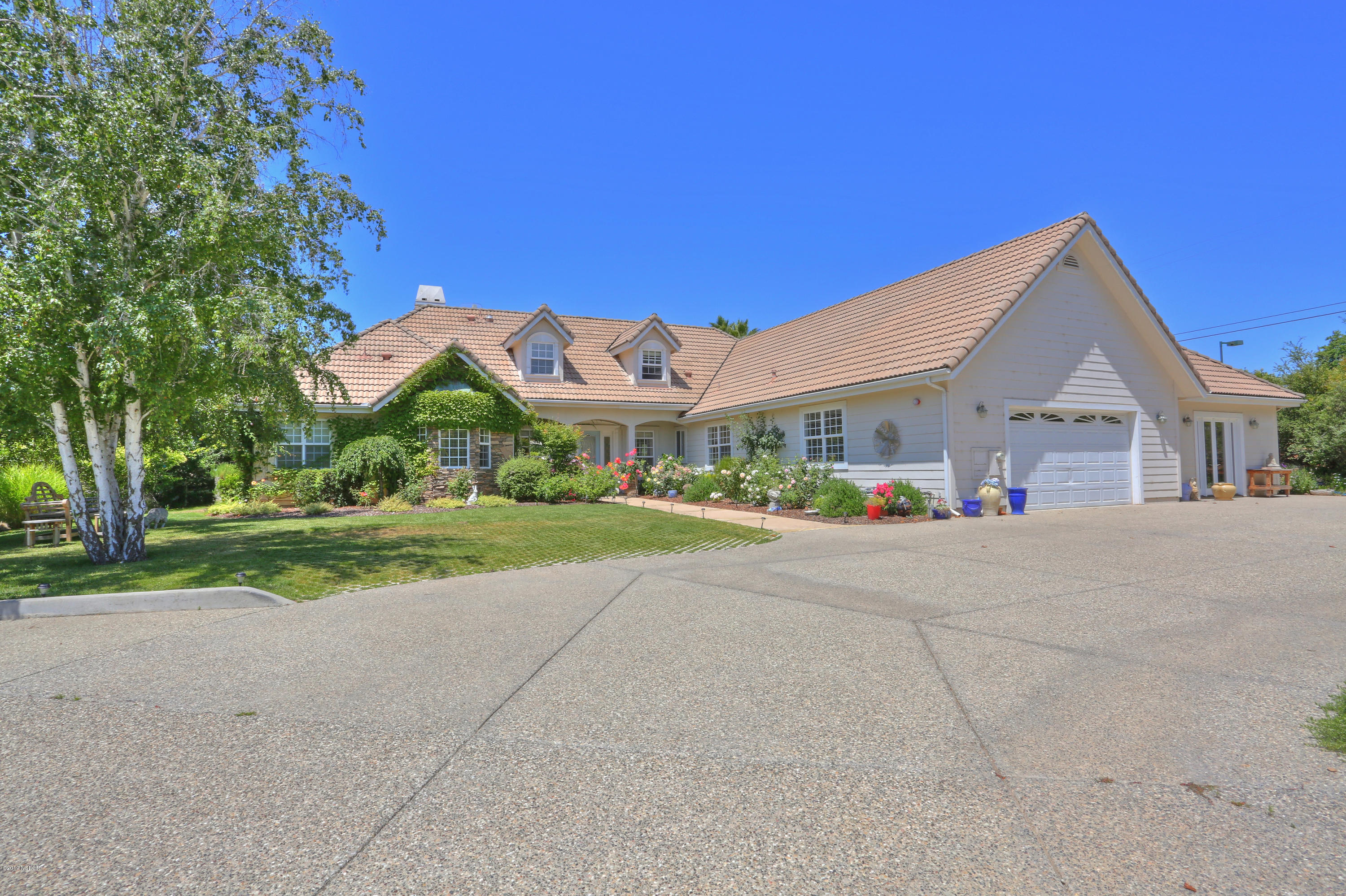 959 Old Ranch Road Solvang, CA 93463 - Photo 29 of 29 a view of house with outdoor space and parking