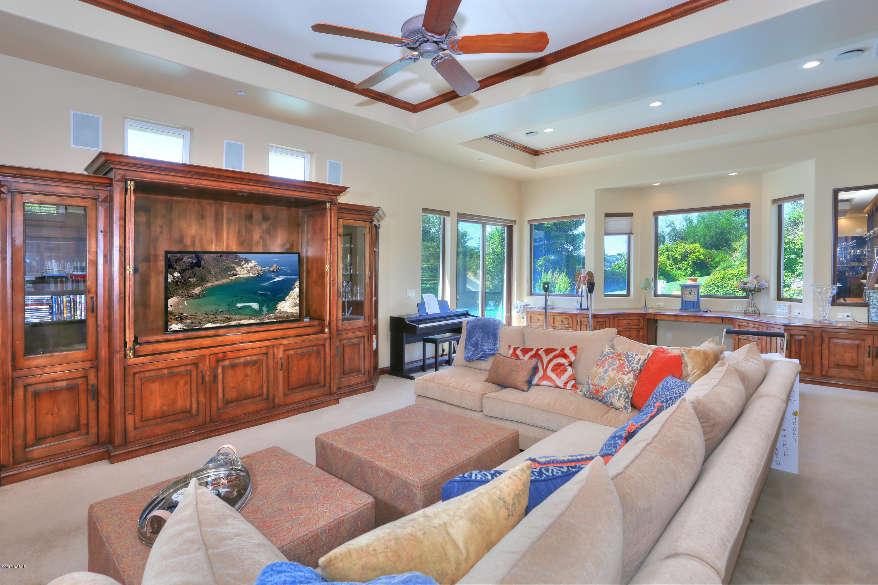 959 Old Ranch Road Solvang, CA 93463 - Photo 5 of 29 a living room with furniture and a flat screen tv