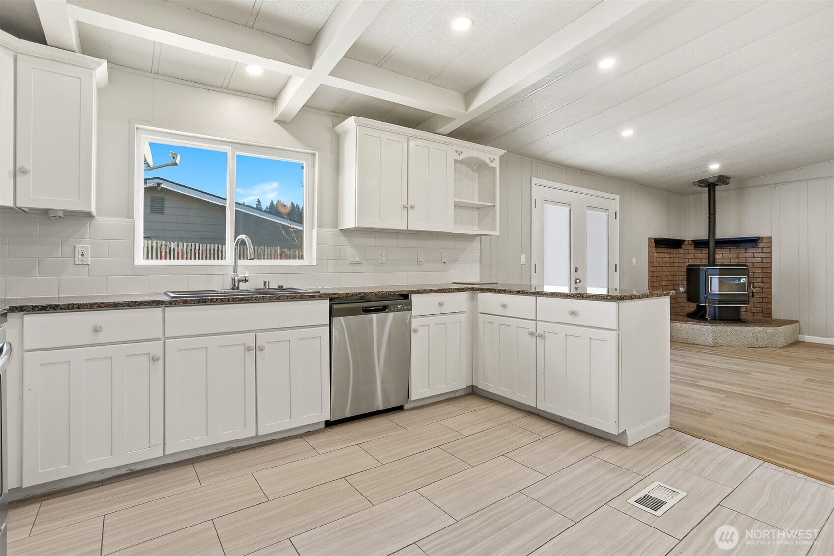 23728 Vista View Avenue Bothell, WA 98021 - Photo 13 of 40 a kitchen with cabinets and window