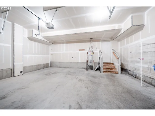 an aerial view of a house with garden and patio