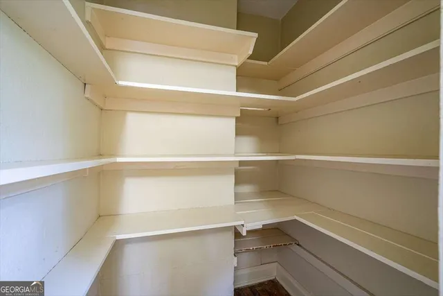 a view of an empty walk in closet