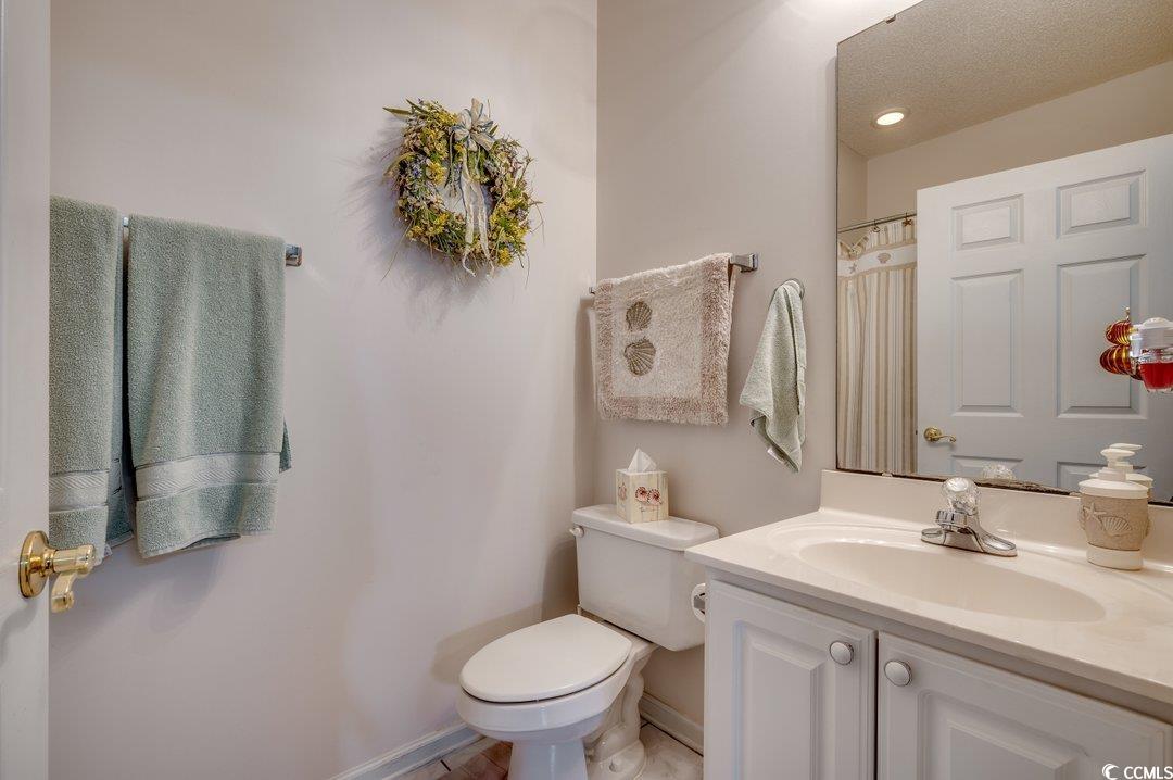 1533 Lanterns Rest Road, Unit 201 Myrtle Beach, SC 29579 - Photo 14 of 40 Bathroom featuring vanity and toilet