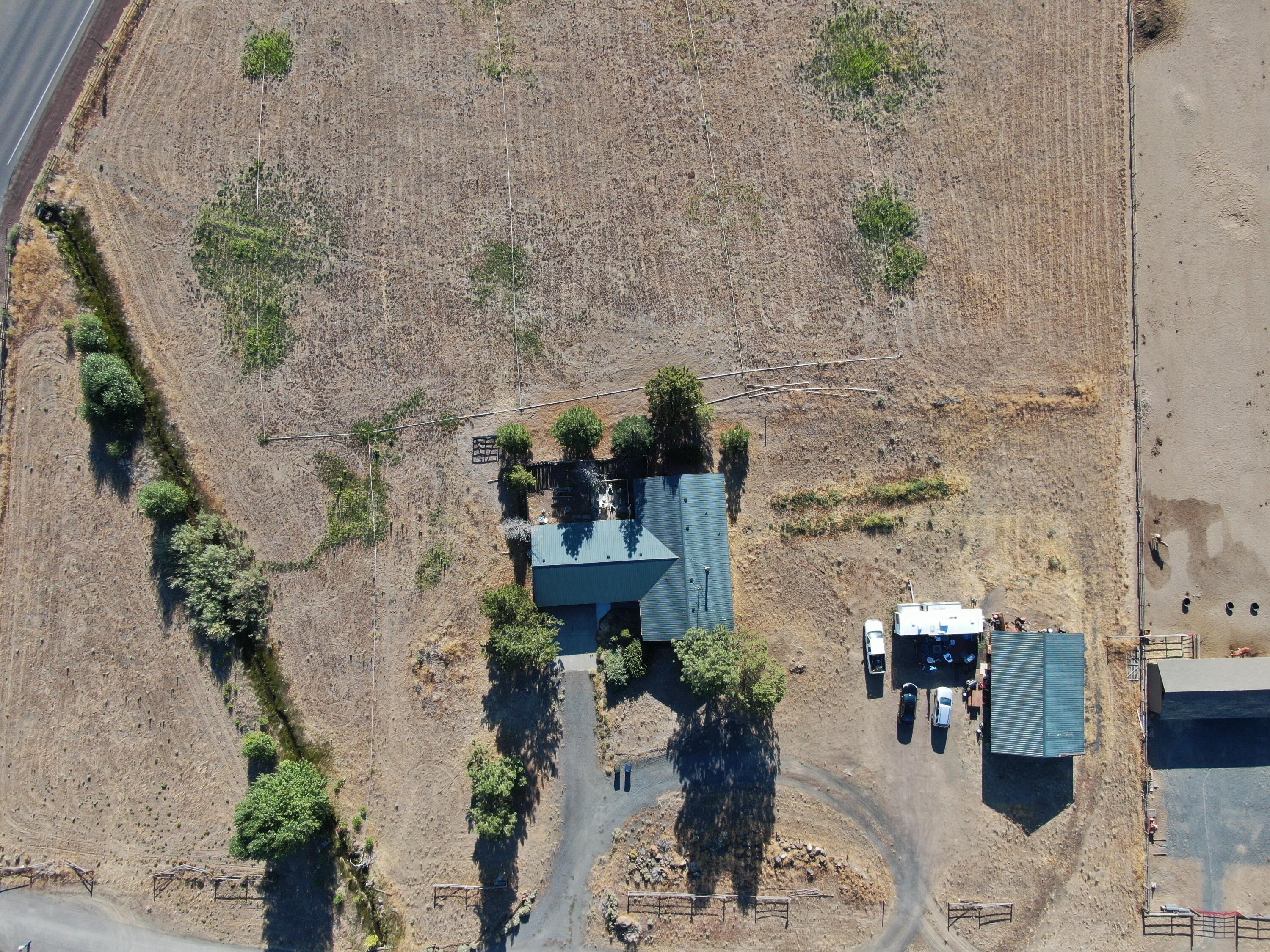19351 Pinehurst Road Bend, OR 97703 - Photo 5 of 5 an aerial view of a house with a yard