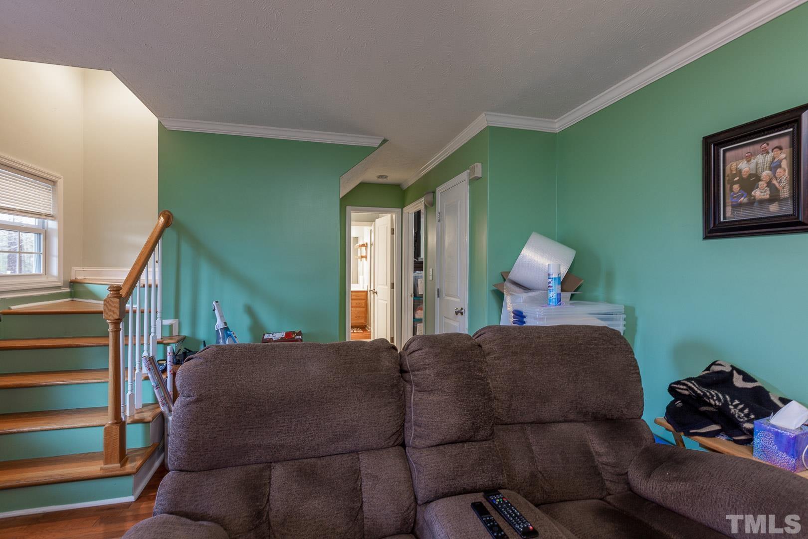 338 Green Path Road Godwin, NC 28344 - Photo 14 of 28 a bed room with furniture and a window