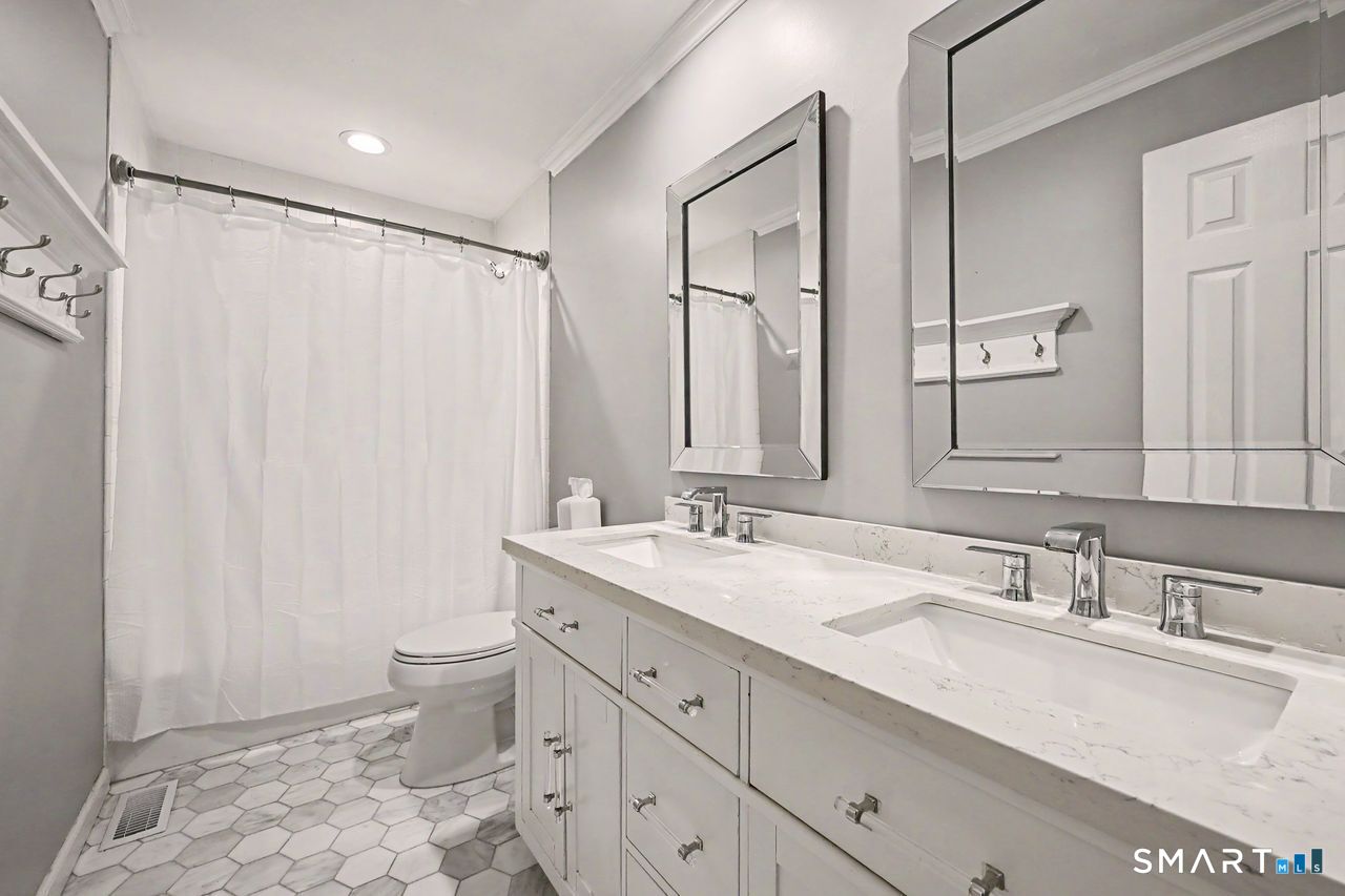 34 Beardsley Road New Milford, CT 06776 - Photo 22 of 40 Hallway Bathroom with Double Sink