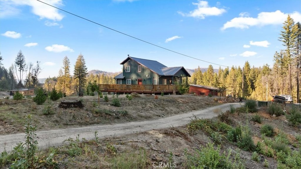 0 Path In The Woods Berry Creek, CA 95916 - Photo 11 of 30 a view of a big house with a big yard and large tree