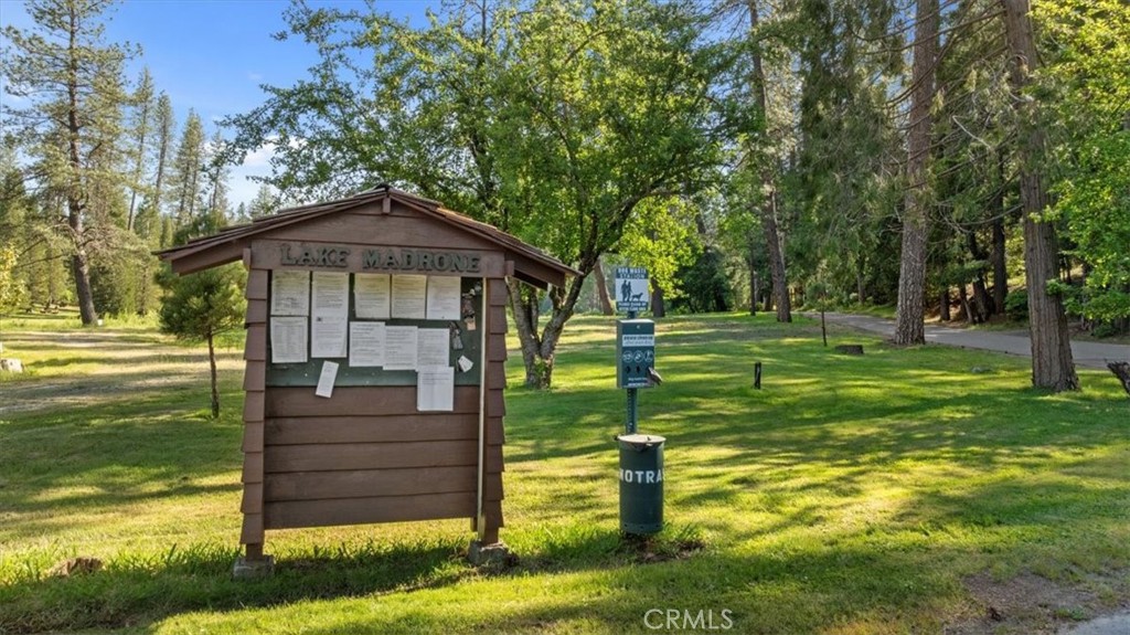 0 Path In The Woods Berry Creek, CA 95916 - Photo 25 of 30 a front view of a house with a yard