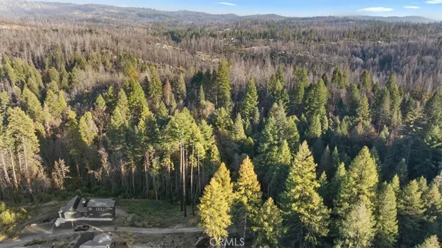 a view of lake with green space
