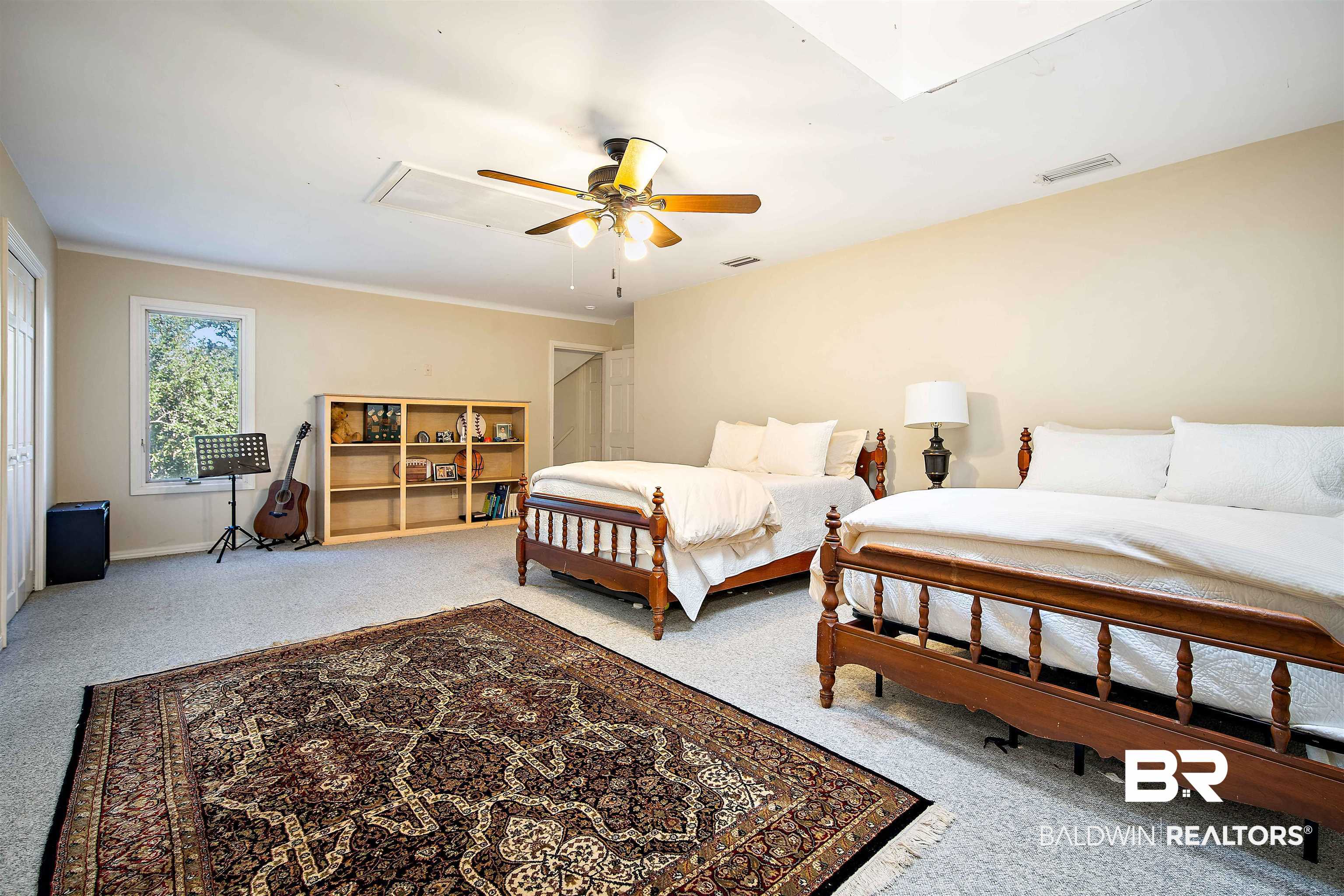 1314 Dauphin Street Mobile, AL 36604 - Photo 45 of 61 Carpeted bedroom featuring ceiling fan