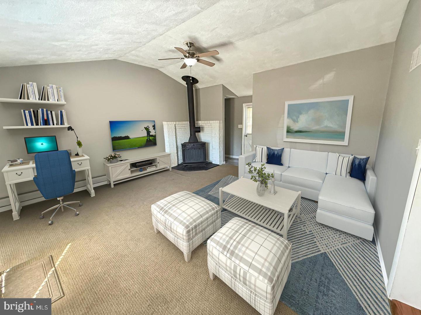 53 Sunset Road Royersford, PA 19468 - Photo 5 of 15 a living room with furniture and a flat screen tv