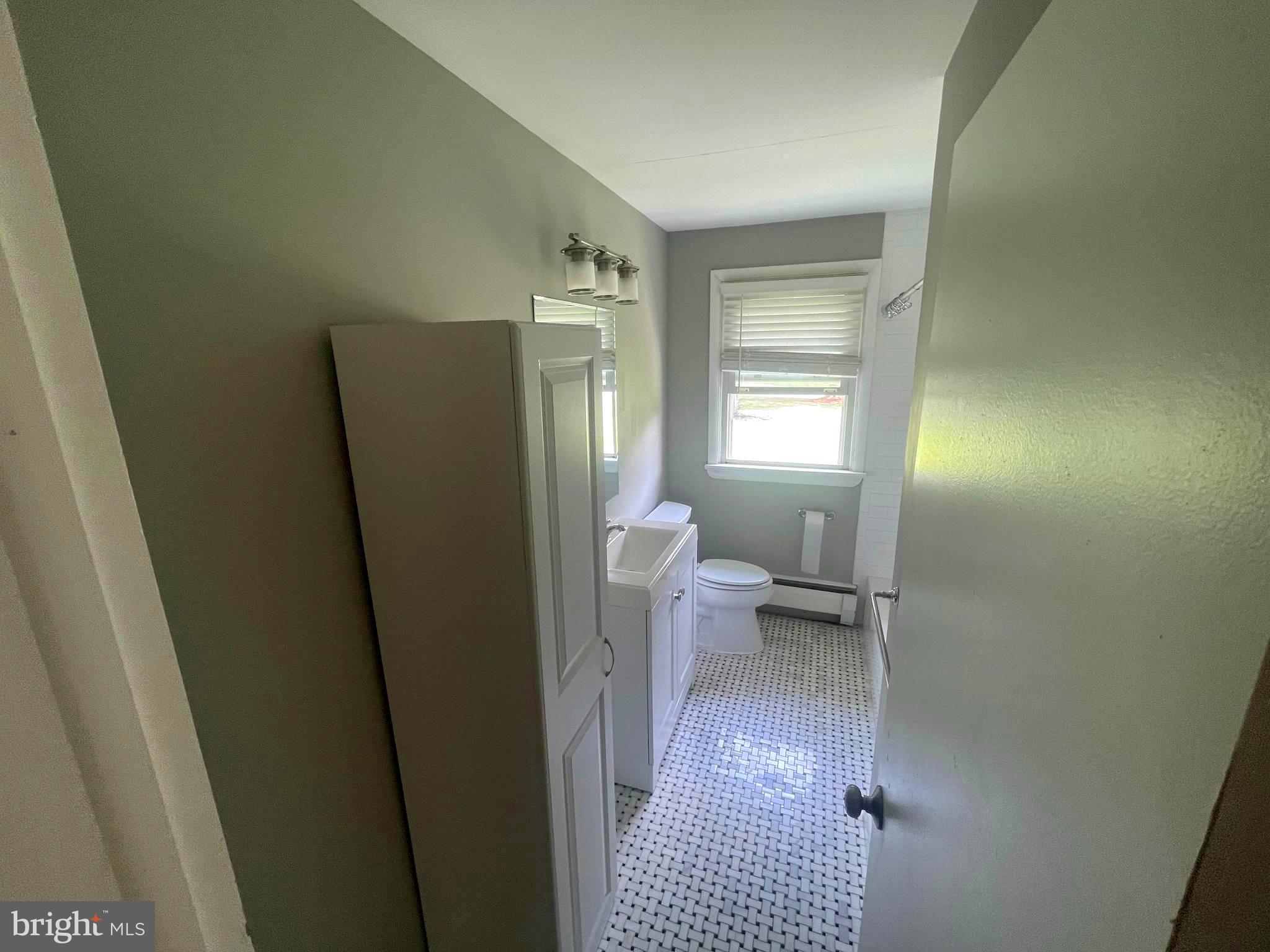 53 Sunset Road Royersford, PA 19468 - Photo 10 of 15 a bathroom with a sink and a mirror