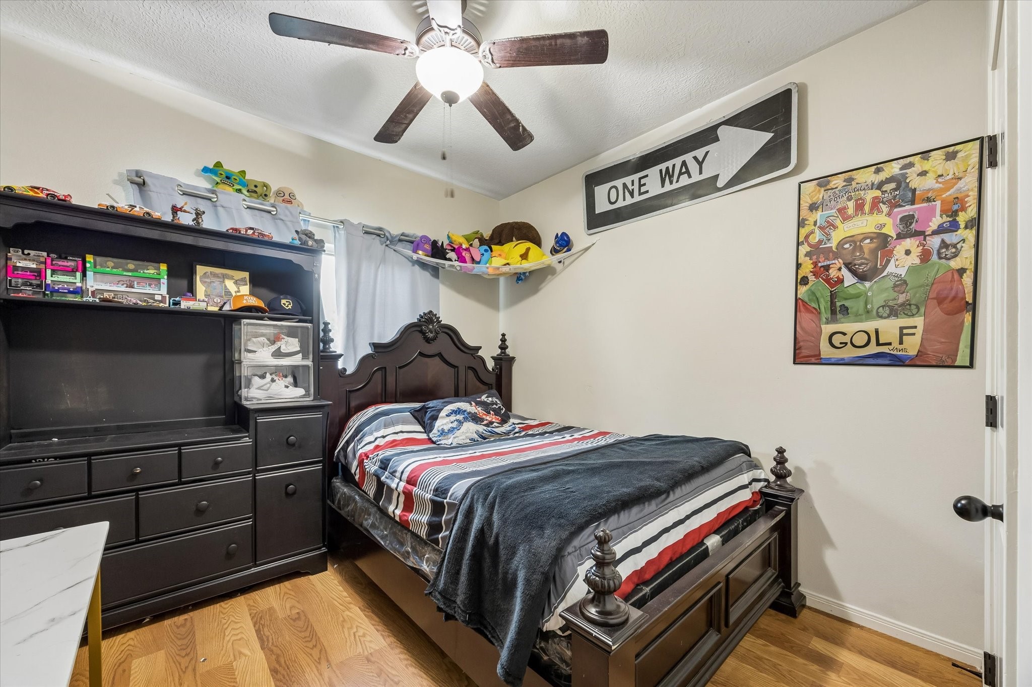 1741 Eagle Lake Road Sealy, TX 77474 - Photo 9 of 15 a bedroom with a bed and a tv in it