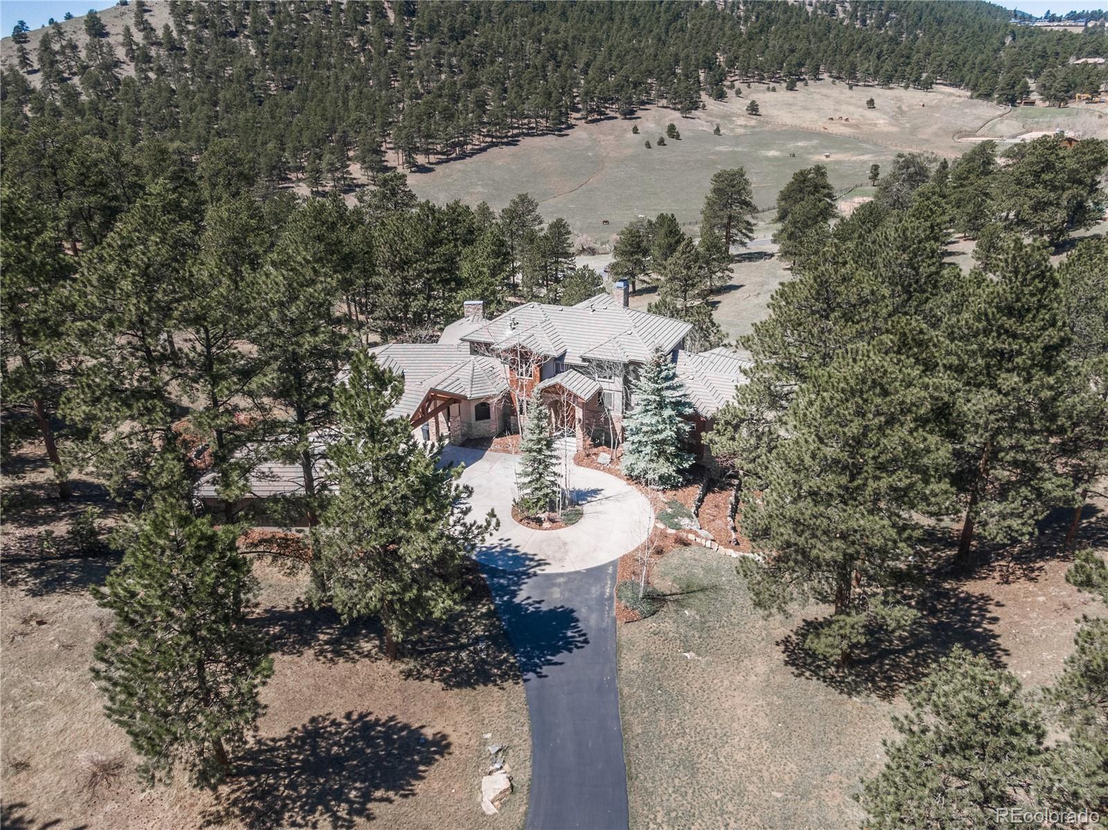 1265 Silver Rock Lane Evergreen, CO 80439 - Photo 2 of 35 a view of a lake view