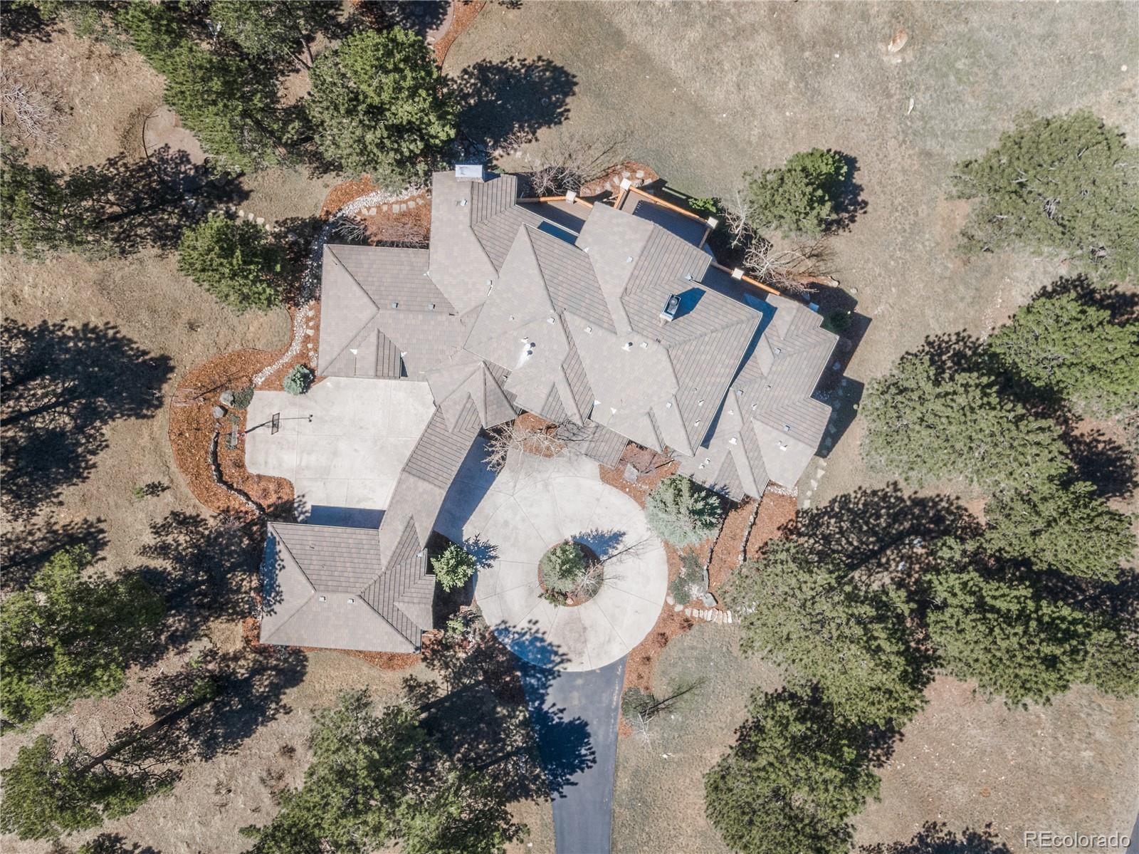 1265 Silver Rock Lane Evergreen, CO 80439 - Photo 33 of 35 an aerial view of residential house with outdoor space
