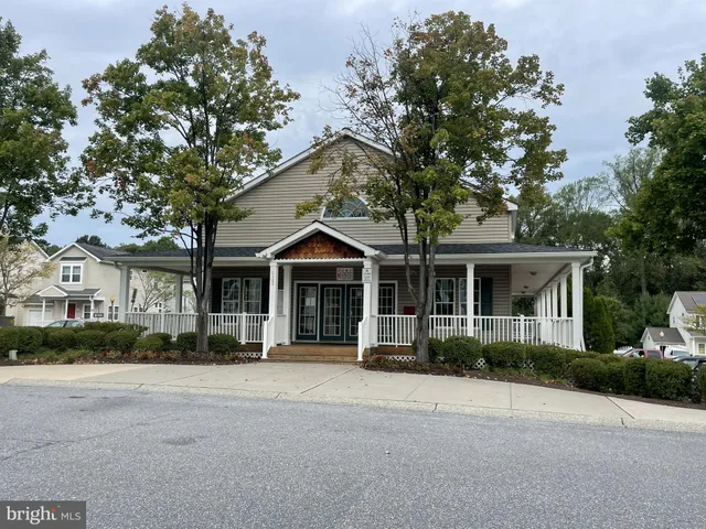 front view of a house with a street