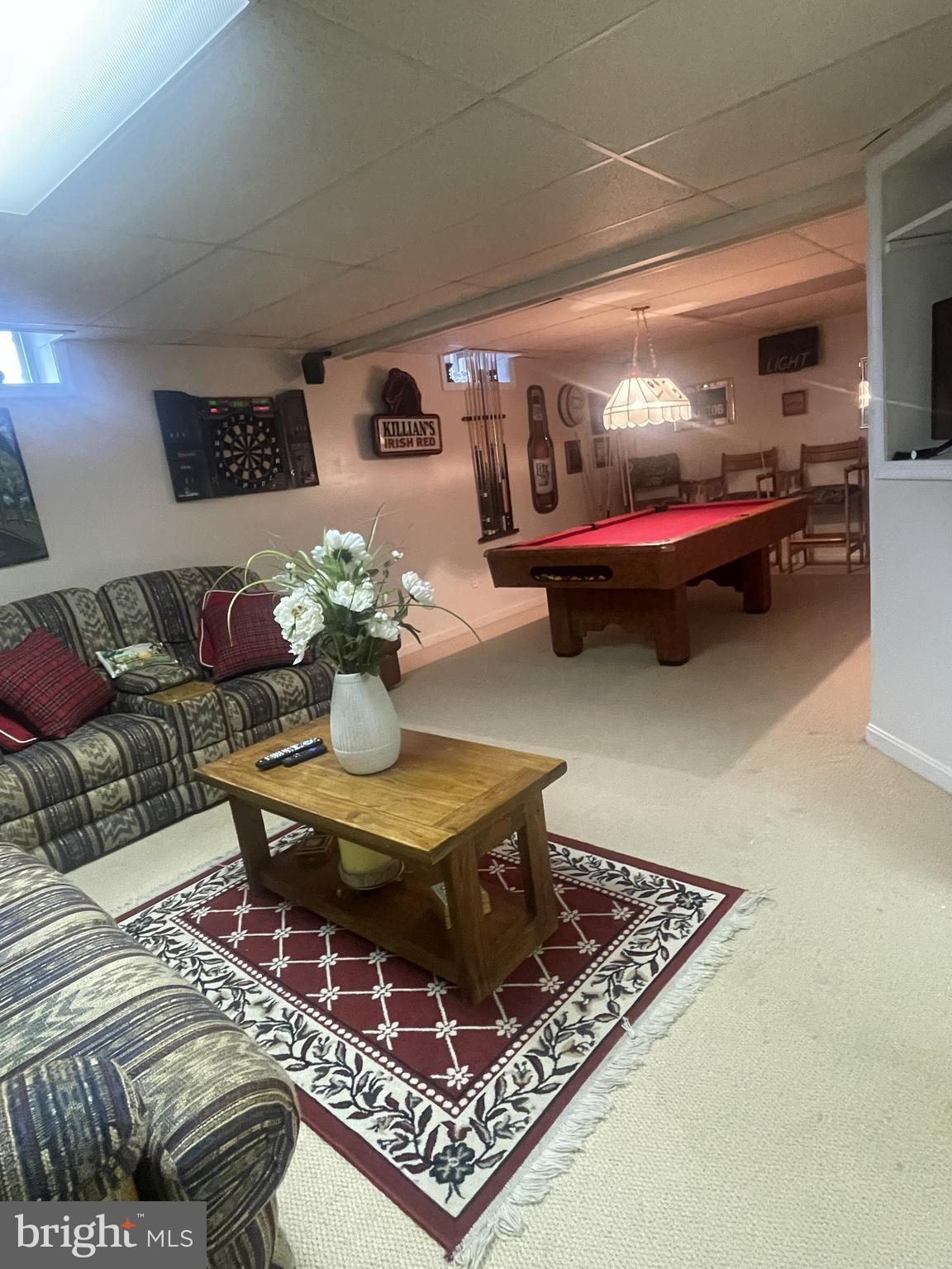 7359 Point Patience Way Elkridge, MD 21075 - Photo 4 of 23 a living room with furniture and a table