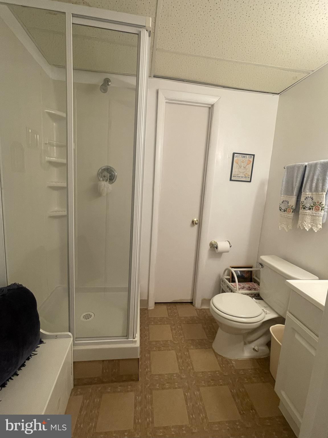 7359 Point Patience Way Elkridge, MD 21075 - Photo 6 of 23 a bathroom with a toilet a sink and shower