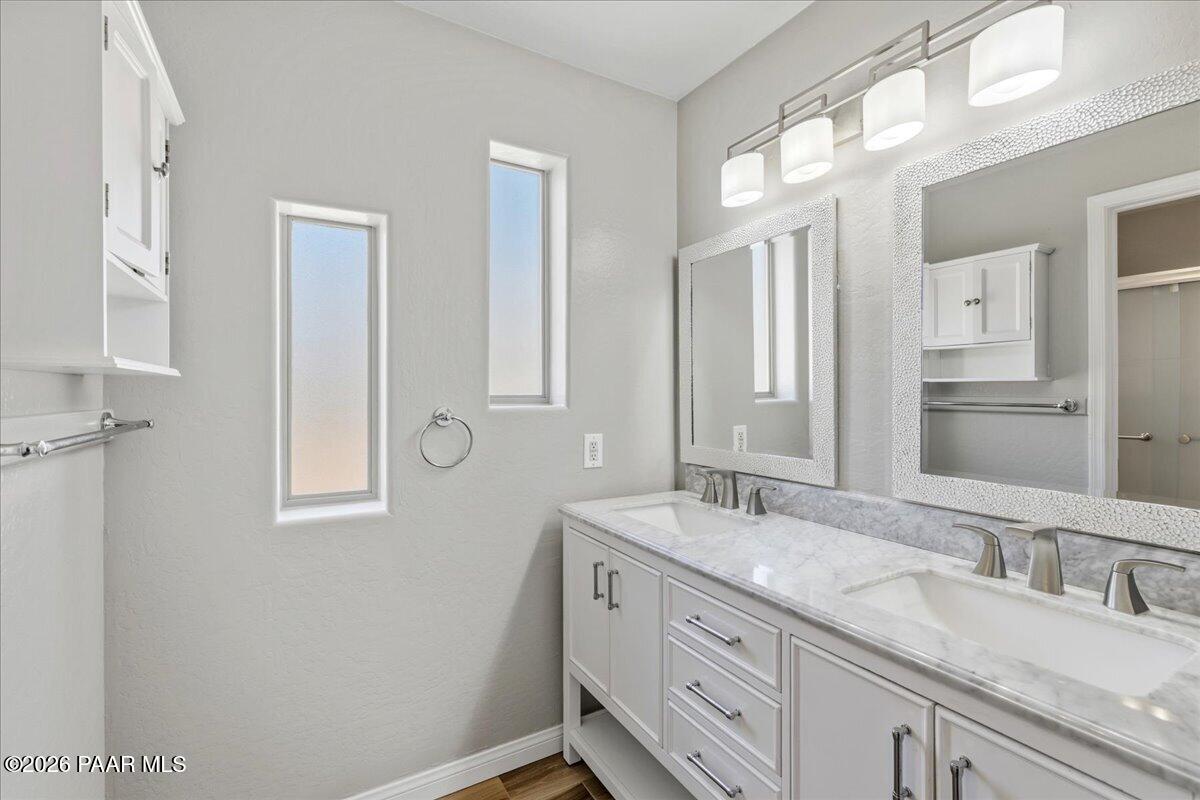 4701 North Spring Drive Prescott Valley, AZ 86314 - Photo 17 of 31 a bathroom with 2 sink and a mirror