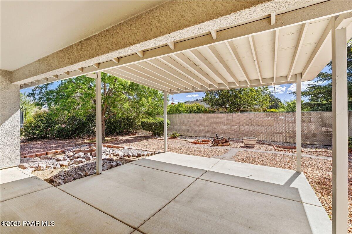 4701 North Spring Drive Prescott Valley, AZ 86314 - Photo 24 of 31 a view of a backyard with a patio