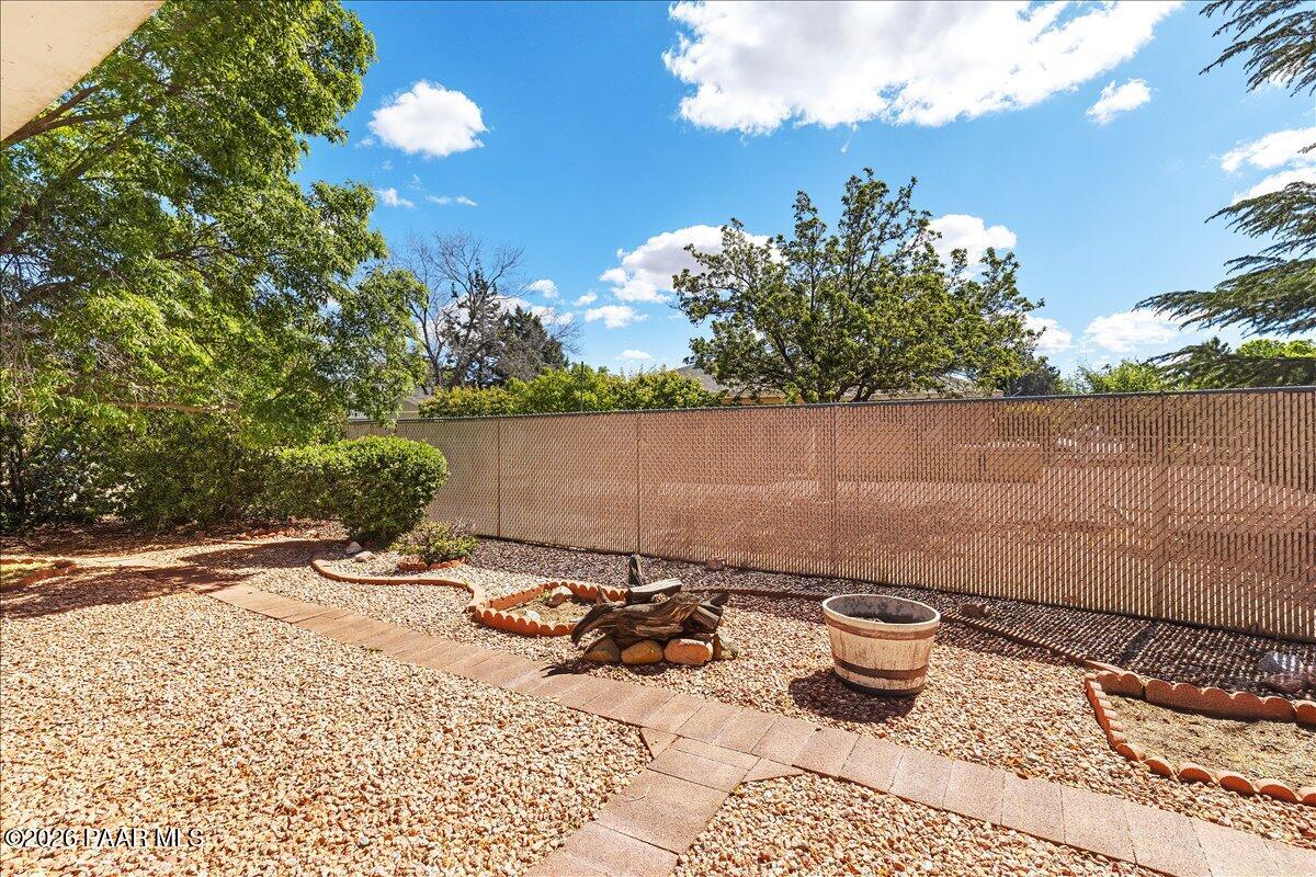 4701 North Spring Drive Prescott Valley, AZ 86314 - Photo 28 of 31 a view of a backyard of a house