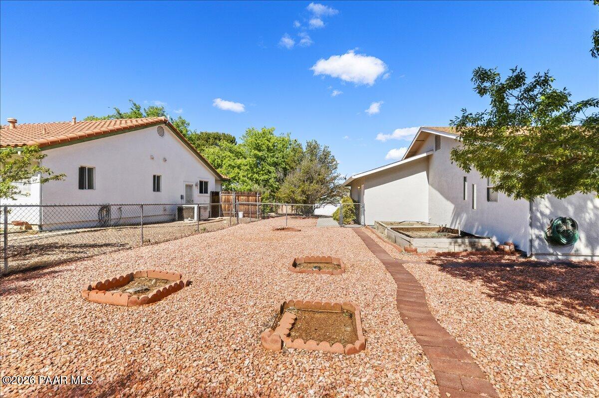 4701 North Spring Drive Prescott Valley, AZ 86314 - Photo 29 of 31 a view of a house with a patio