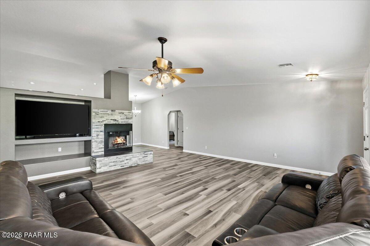 4701 North Spring Drive Prescott Valley, AZ 86314 - Photo 8 of 31 a living room with furniture and a fireplace