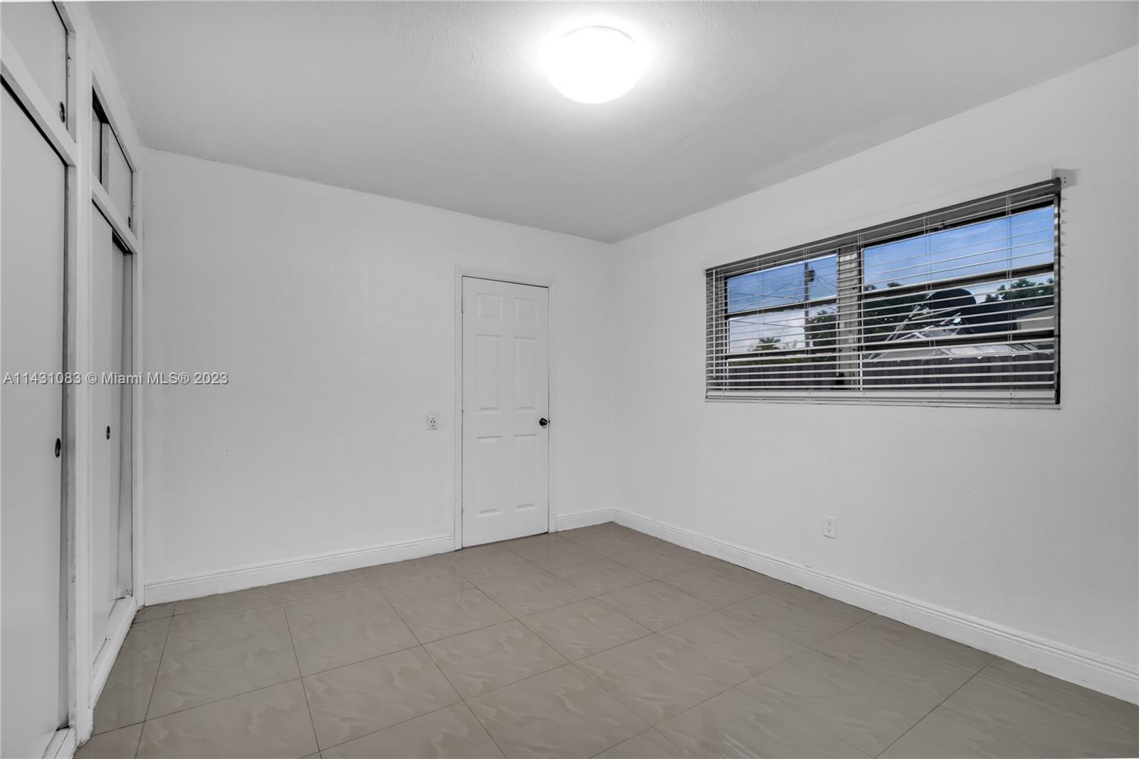 12371 Southwest 191st Street Miami, FL 33177 - Photo 8 of 19 a view of empty room