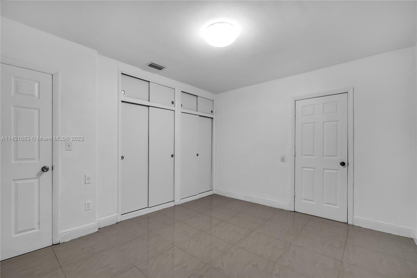 12371 Southwest 191st Street Miami, FL 33177 - Photo 9 of 19 a view of an empty room