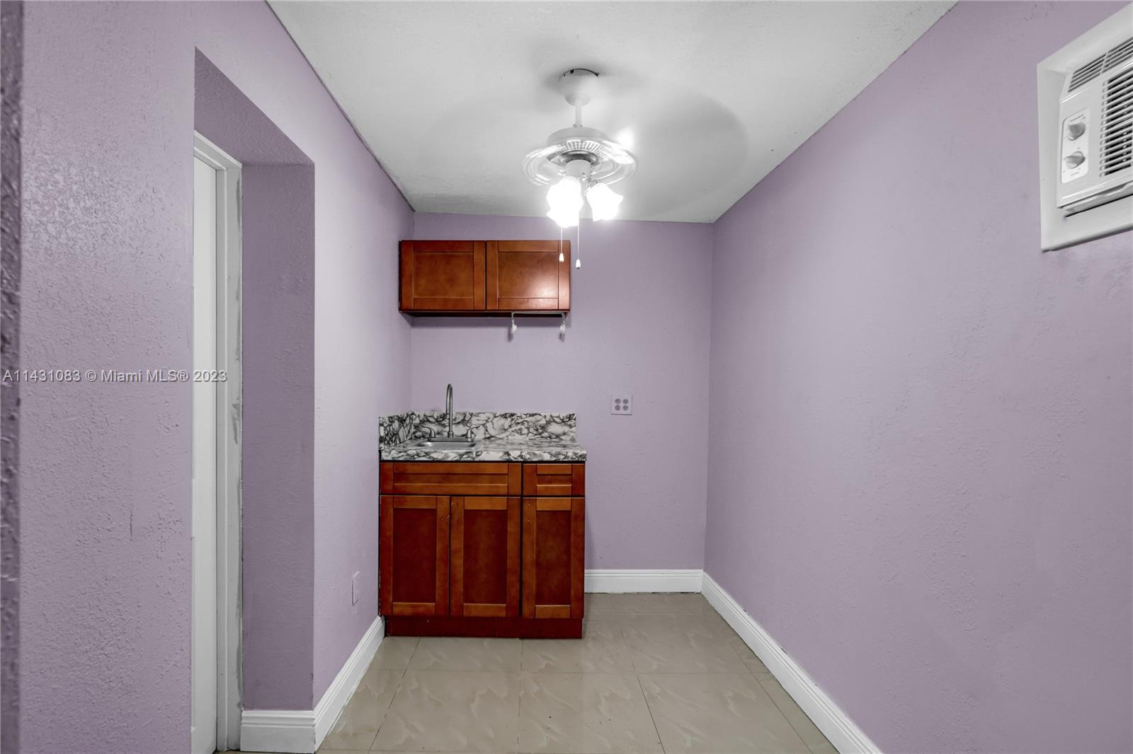 12371 Southwest 191st Street Miami, FL 33177 - Photo 10 of 19 wooden floor in a hall with an entryway