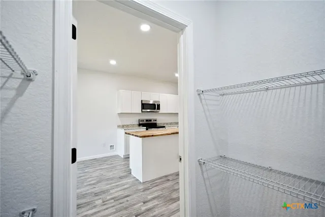 a bathroom with a sink a toilet and bathtub