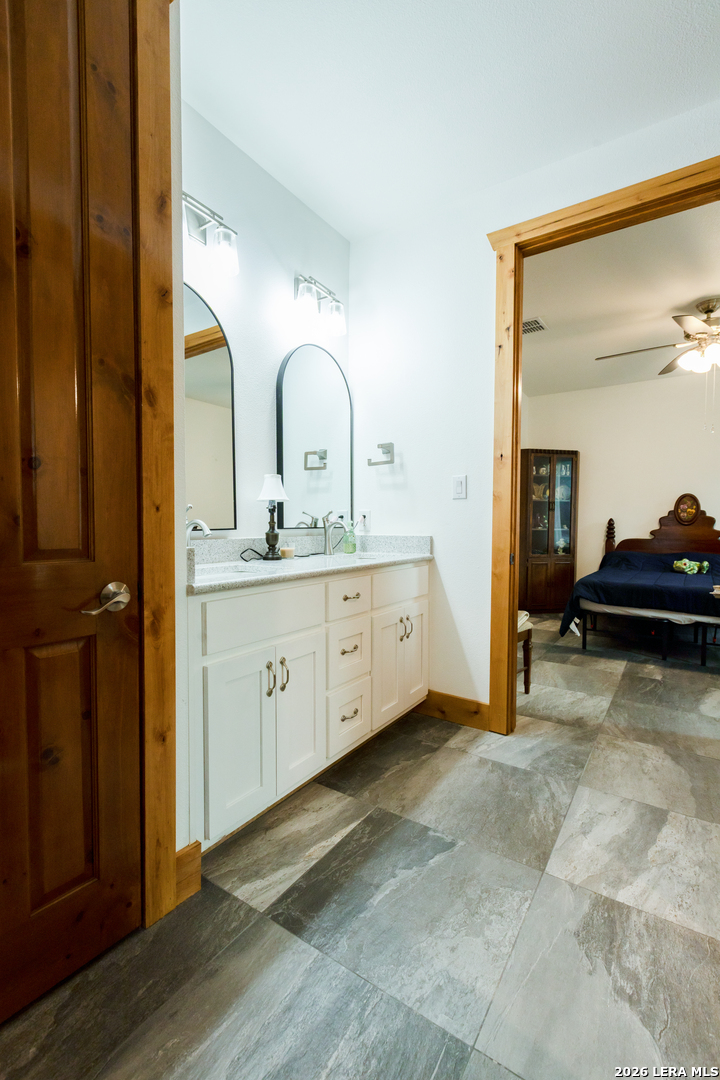 525 Windmill Drive Bandera, TX 78003 - Photo 20 of 28 a view of bathroom with dual sinks