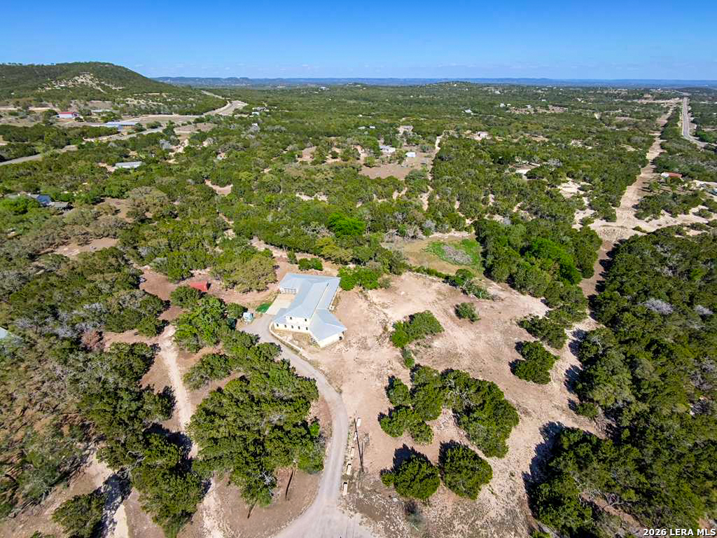 525 Windmill Drive Bandera, TX 78003 - Photo 27 of 28 view of city and mountain