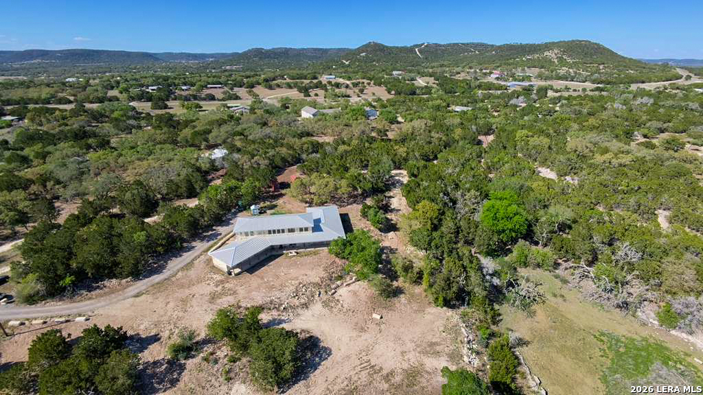 525 Windmill Drive Bandera, TX 78003 - Photo 4 of 28 an aerial view of a house with a yard