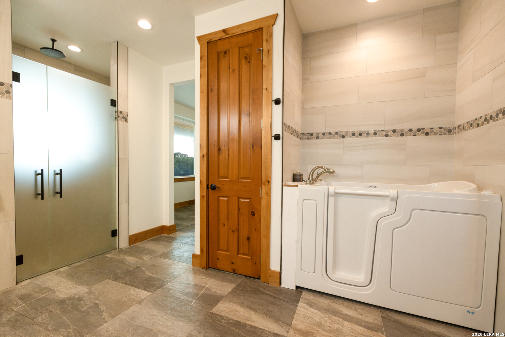 525 Windmill Drive Bandera, TX 78003 - Photo 9 of 28 a view of a bathroom with shower