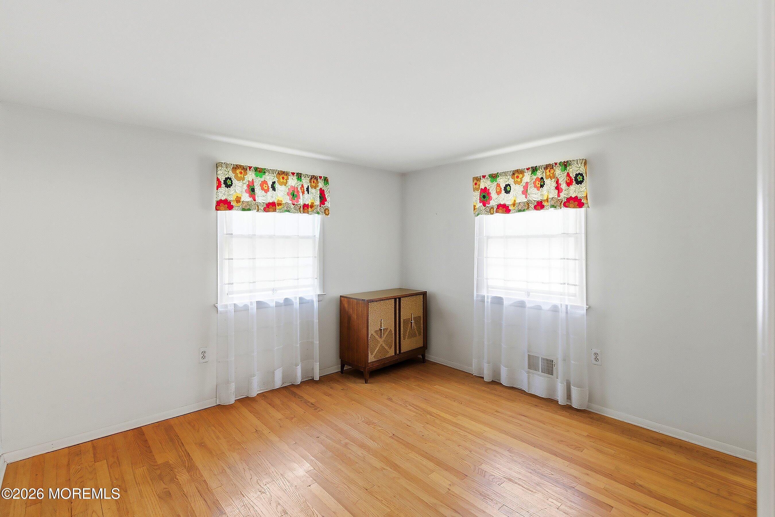 464 Newport Road Forked River, NJ 08731 - Photo 13 of 23 an empty room with a window