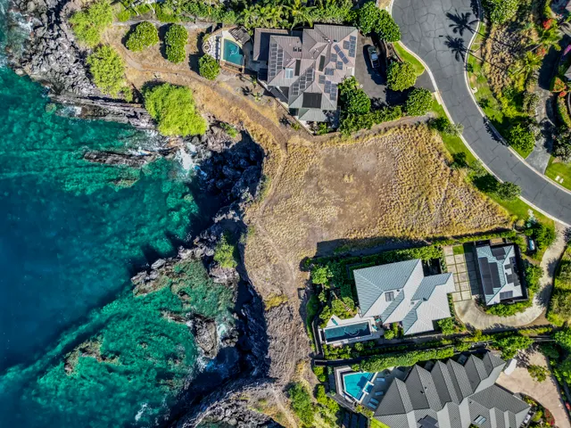 a view of a lake in middle of forest