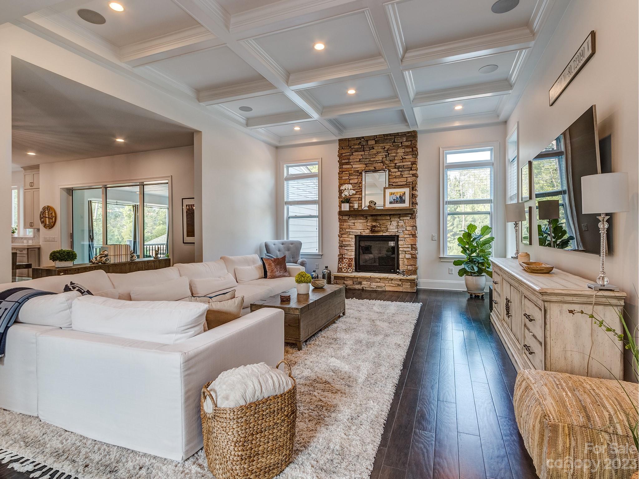 411 Turtleback Ridge Weddington, NC 28104 - Photo 13 of 48 a living room with furniture fireplace and a flat screen tv