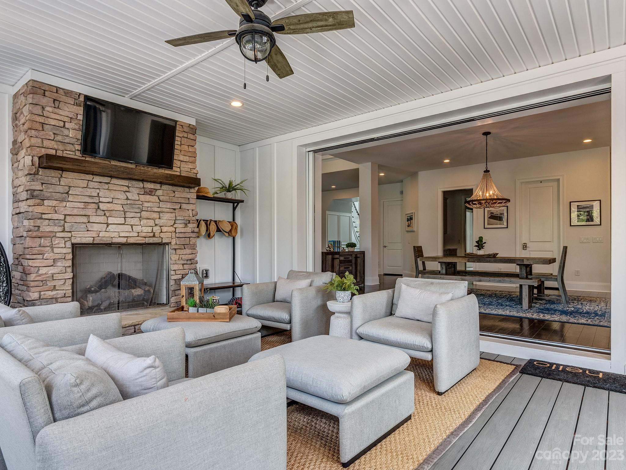 411 Turtleback Ridge Weddington, NC 28104 - Photo 20 of 48 a living room with furniture and a fireplace
